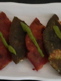 A picture of Paneer Stuffed Beetroot / Spinach Paratha.