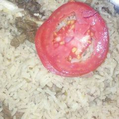 A picture of Ginger rice with meat.