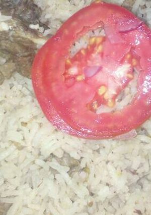A picture of Ginger rice with meat.