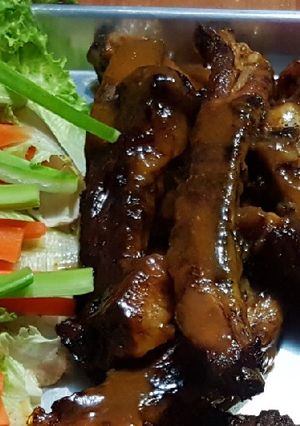 Una foto de Costillas mango habanero
