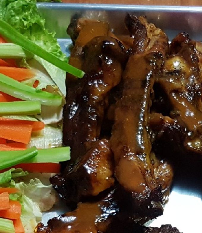 Una foto de Costillas mango habanero