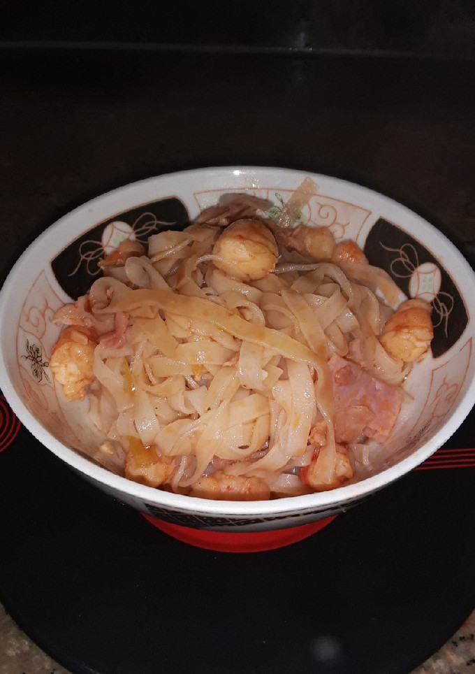 Una foto de Noodles de arroz con gambas