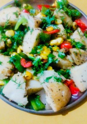 A picture of Colorful tossed idlis.