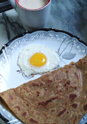 A picture of Anda Paratha with doodh pati😋.