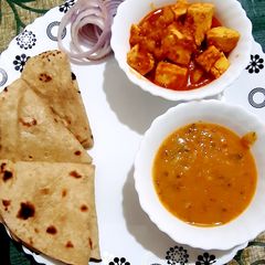 A picture of Dal fry,sahi paneer,butter roti.