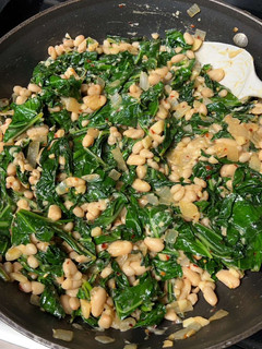 A picture of Beans and greens- Italian style.