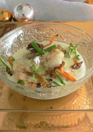 Une photo de Joues de lotte aux chanterelles sauce crémeuse au sarrasin
