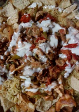 A picture of Fatteh Shawarma with Toum Sauce.