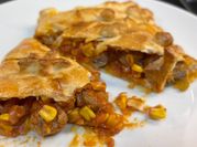 Una foto de masa empanadas de chiles