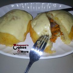 A picture of Fry & baked potato bounced with cheese.