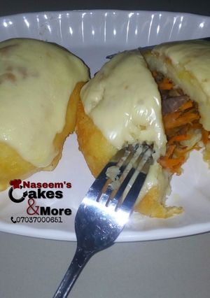 A picture of Fry & baked potato bounced with cheese.