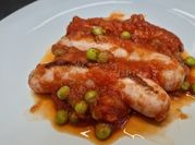 Una foto de pollo entomatado