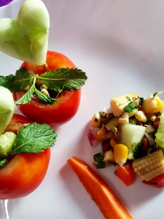 A picture of Tomato Cups Sprout Salad.