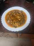 Guiso de garbanzos con secreto ibérico y espinacas