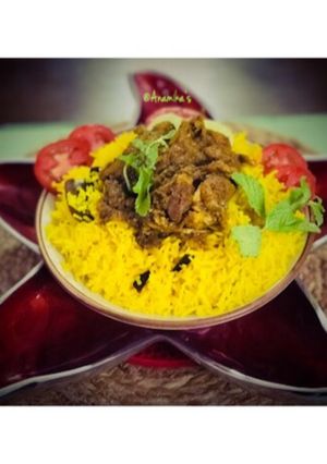 A picture of Lunch: Basanti Pulao with Chicken Kosha/Bhuna Chicken.