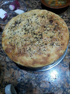 A picture of Sourdough bread in a pan.
