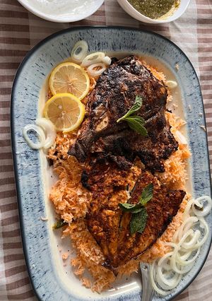 A picture of Baked Fish with Mandi Rice.
