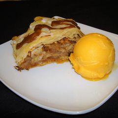 A picture of Apple strudel with phyllo crust.
