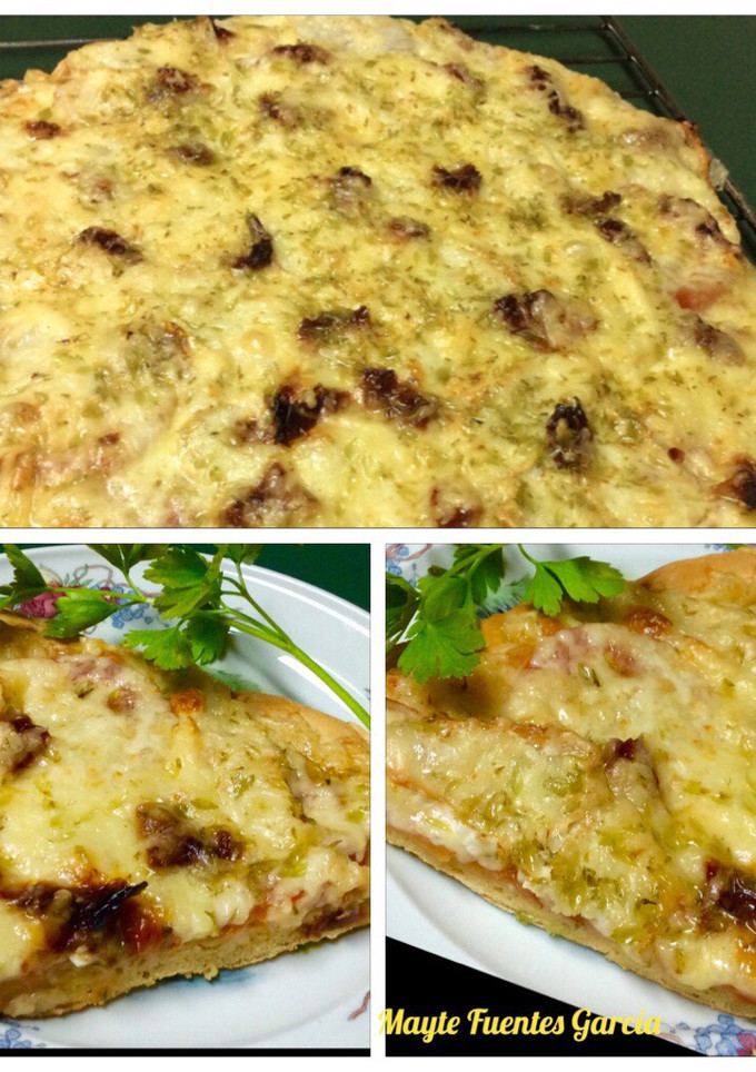 Una foto de Pizza cuatro quesos
