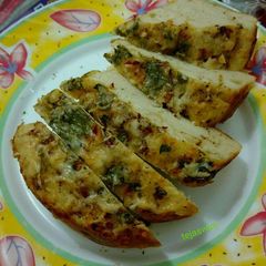 A picture of Herbs and garlic bread.