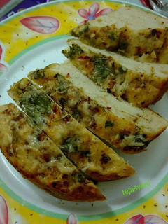 A picture of Herbs and garlic bread.