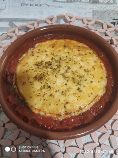Una foto de Queso provolone al horno