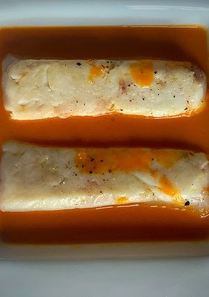 Una foto de Lingotes de merluza en caldo oriental