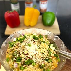 A picture of Cheesy vegetable maggi.