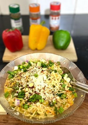 A picture of Cheesy vegetable maggi.