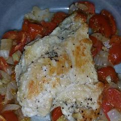 A picture of Chicken with Roasted Tomato and Red Onions.