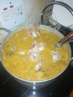 A picture of Groundnut soup with chicken.
