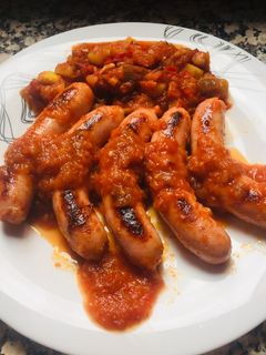 Una foto de Salchichas con pisto
