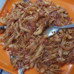 A picture of Tangy onion tomato pasta.