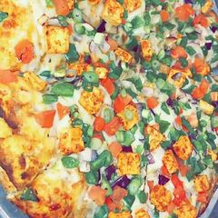 A picture of Cheese paneer pizza.