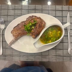 A picture of Juiciest Pork Chop EVER - WOWWEEEEEE :P.