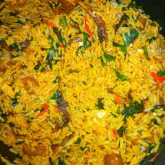 NATIVE JOLLOF RICE /PALM OIL RICE - IWUK EDESI RECIPE A picture of NATIVE JOLLOF RICE /PALM OIL RICE - IWUK EDESI RECIPE.