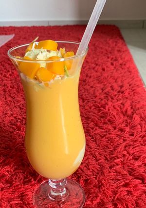 A picture of Mango milkshake with Ice cream.