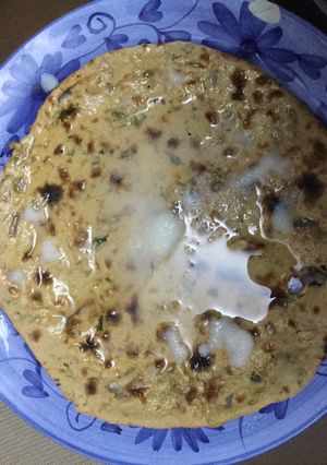 A picture of Gram roti with butter.
