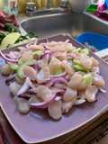 Callos de hacha en salsa negra