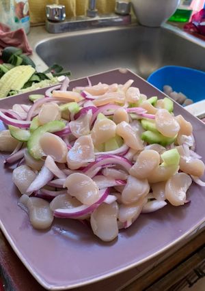 Una foto de Callos de hacha en salsa negra