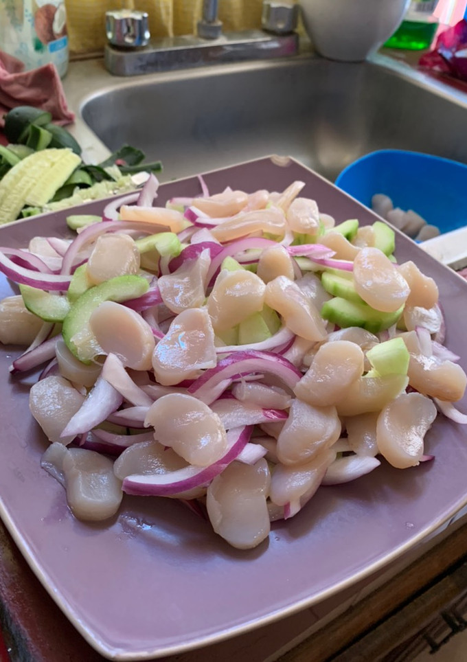 Una foto de Callos de hacha en salsa negra