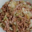 Round cabbage with ham and onion