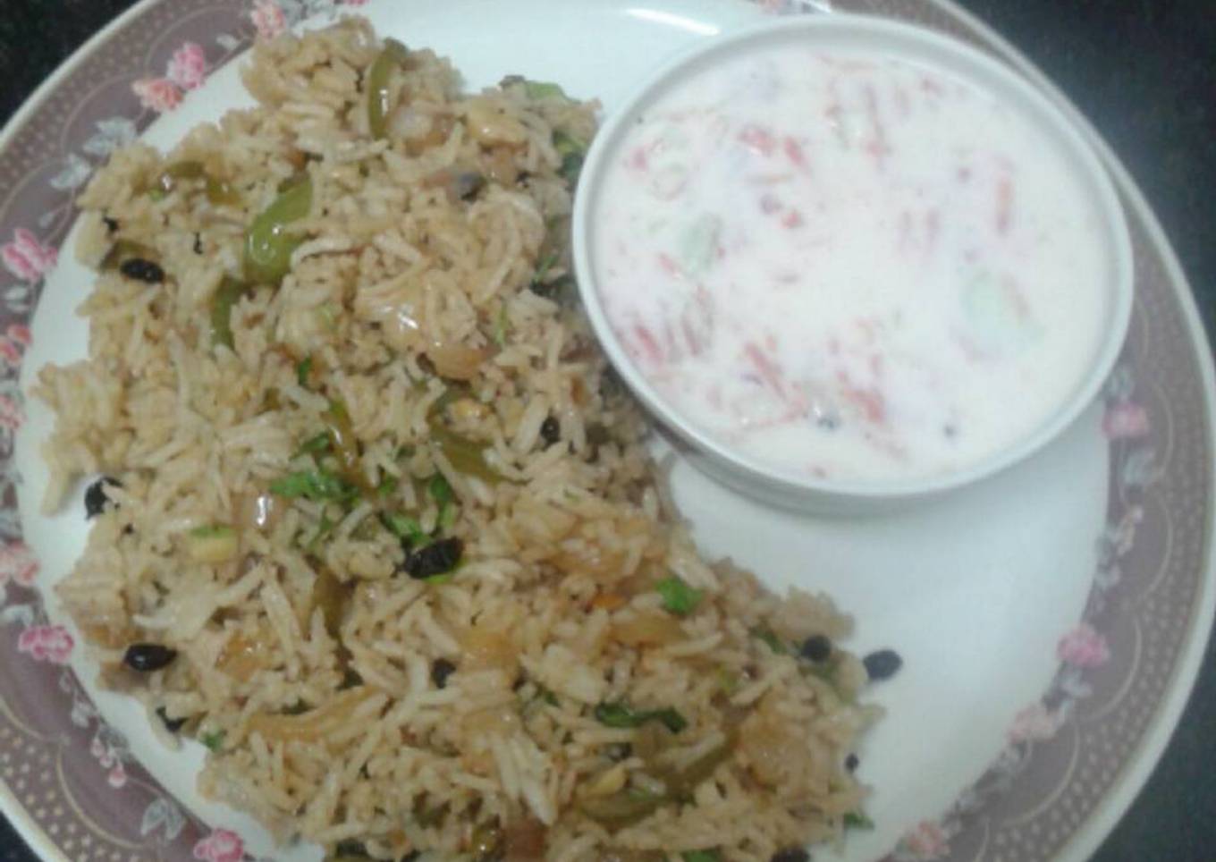 Pineapple fried rice with mixed vegetable raita
