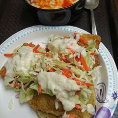 A picture of Fish Tacos with Grits.