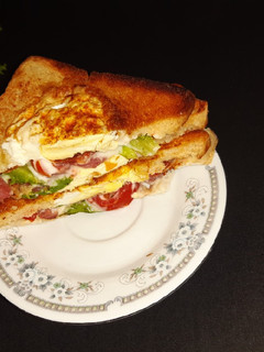A picture of Egg in a hole sandwich.