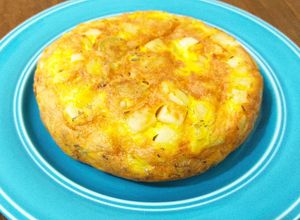 Una foto de Tortilla de papas, queso y aceitunas en Essen