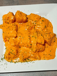 Una foto de Bacalao skrei en salsa de piquillo