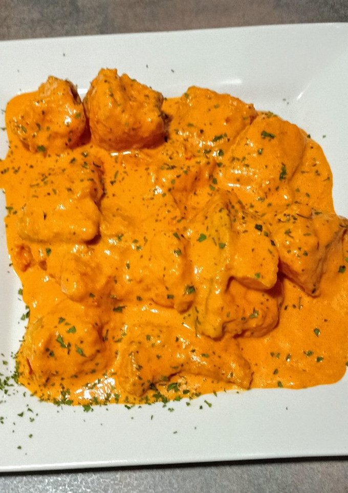 Una foto de Bacalao skrei en salsa de piquillo