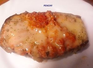 Una foto de Berenjenas con beicon, carne picada y queso de Mahon