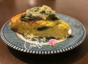 Una foto de Pastel de elote con rajas poblanas🌹